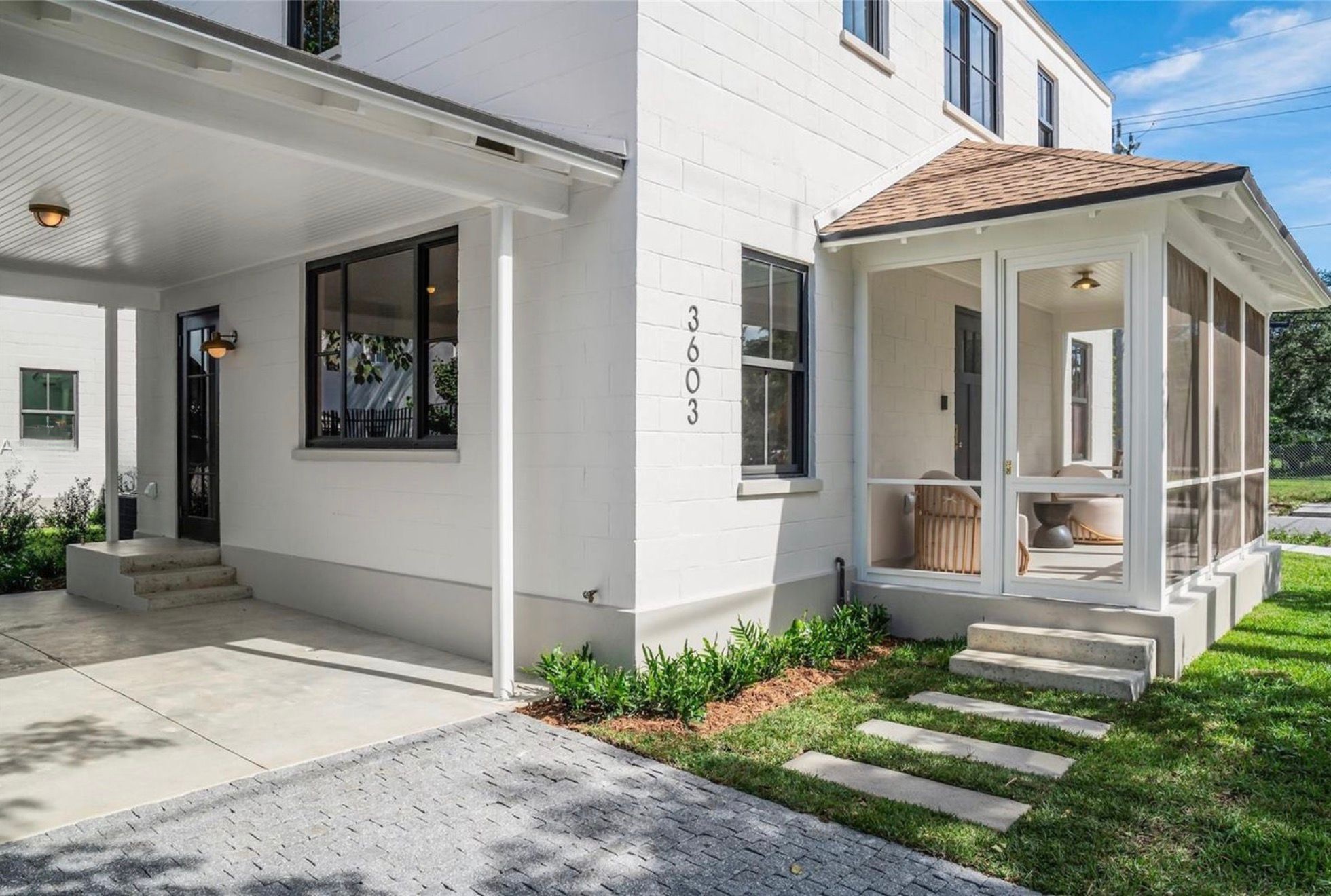 Front entry and screened porch of the home
